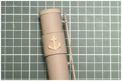 ein abgeformter M&uuml;tzenanstecker wird zur Schornsteinmarke