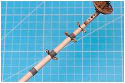 Blockpaare an Rundhölzern