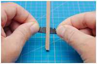 Auseinanderschneiden der beklebten Leisten