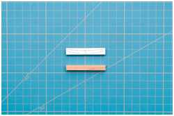 Leisten für den Ankerstock mit doppelseitigem Klebeband fixiert