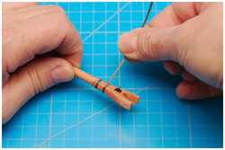 Metallbänder mit Pappstreifen imitiert