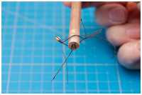 Blockpaare an Rundhölzern