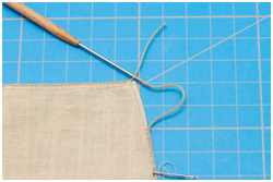 Seitenliek durch das Oberliek stecken