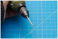 dünne Rundhölzer schleifen