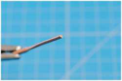 dünne Rundhölzer schleifen